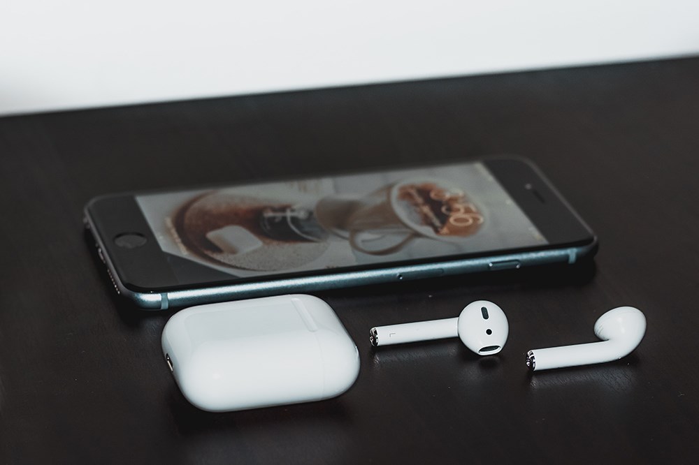 What is the Button on the Airpods Case For?