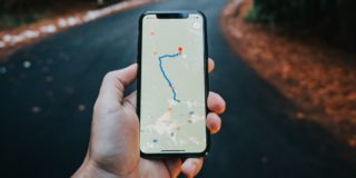 Man using Google Maps on an iPhone
