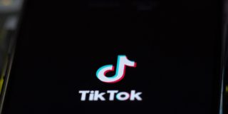 TikTok logo on phone