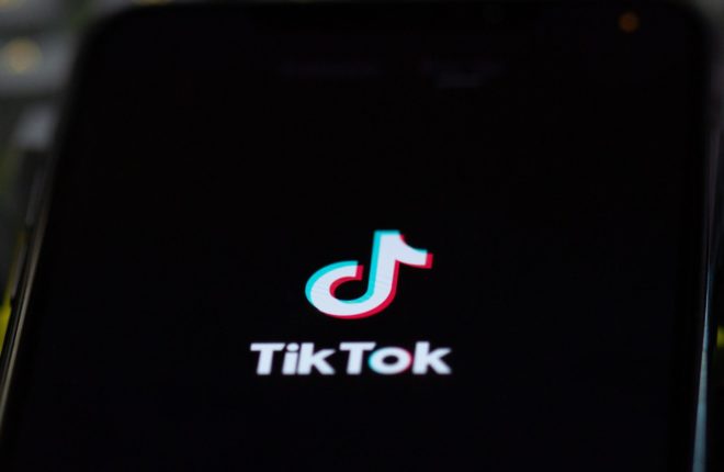 TikTok logo on phone